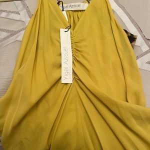 Never worn with tags mustard and animal print top